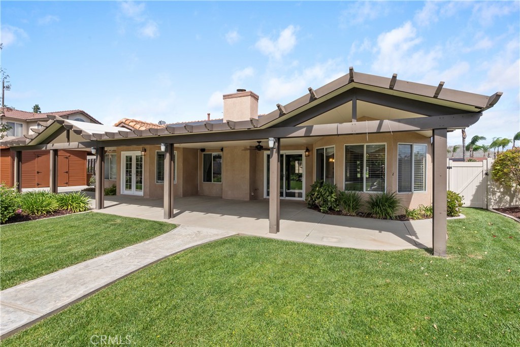 6717 Mission Grove Parkway North Riverside, CA 92506 - Photo 46 of 58 front view of a house with a yard