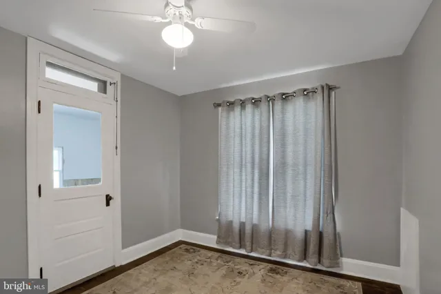 a bathroom with a shower curtain