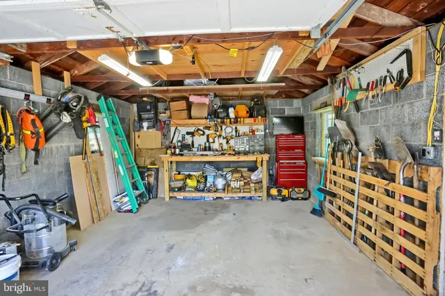 a backyard of a house with outdoor seating