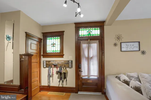 a view of a livingroom with furniture and windows