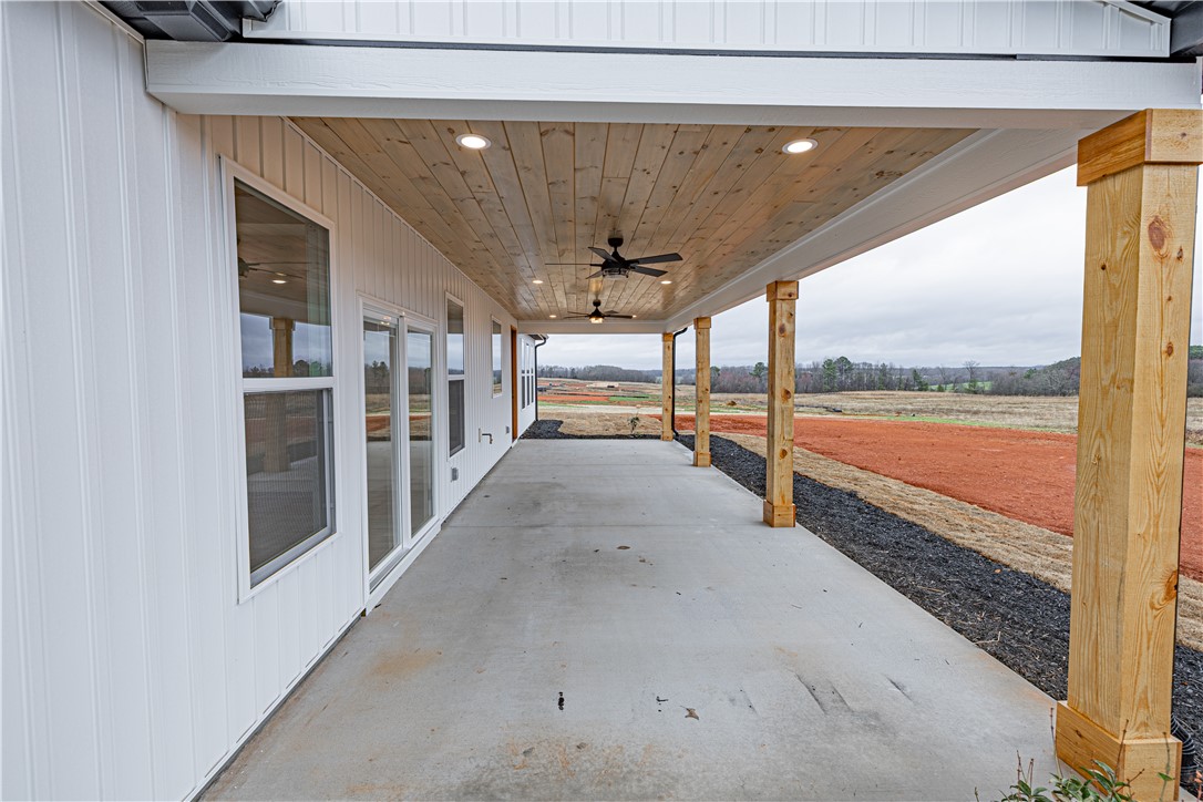 110 Hart Road Anderson, SC 29621 - Photo 11 of 31 An inviting covered patio offers a spacious outdoor living area with picturesque views.