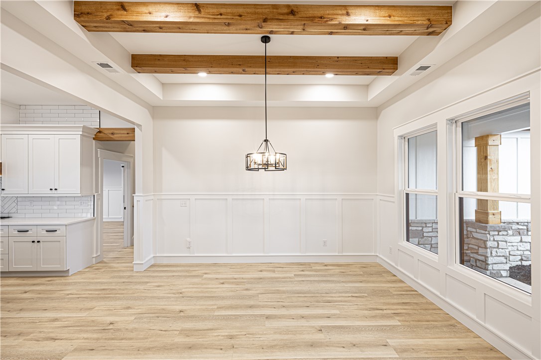 110 Hart Road Anderson, SC 29621 - Photo 15 of 31 This bright room showcases beautiful wood beams and elegant paneled walls.