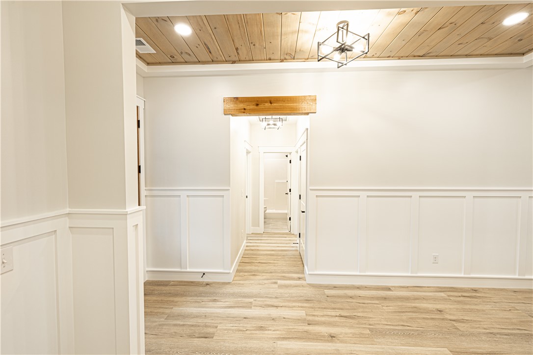 110 Hart Road Anderson, SC 29621 - Photo 23 of 31 This bright space features unique ceiling details and durable flooring, offering a fresh, inviting atmosphere.
