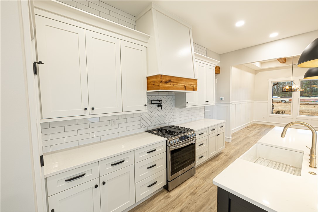 110 Hart Road Anderson, SC 29621 - Photo 3 of 31 This bright kitchen features sleek appliances and ample counter space, perfect for culinary endeavors.