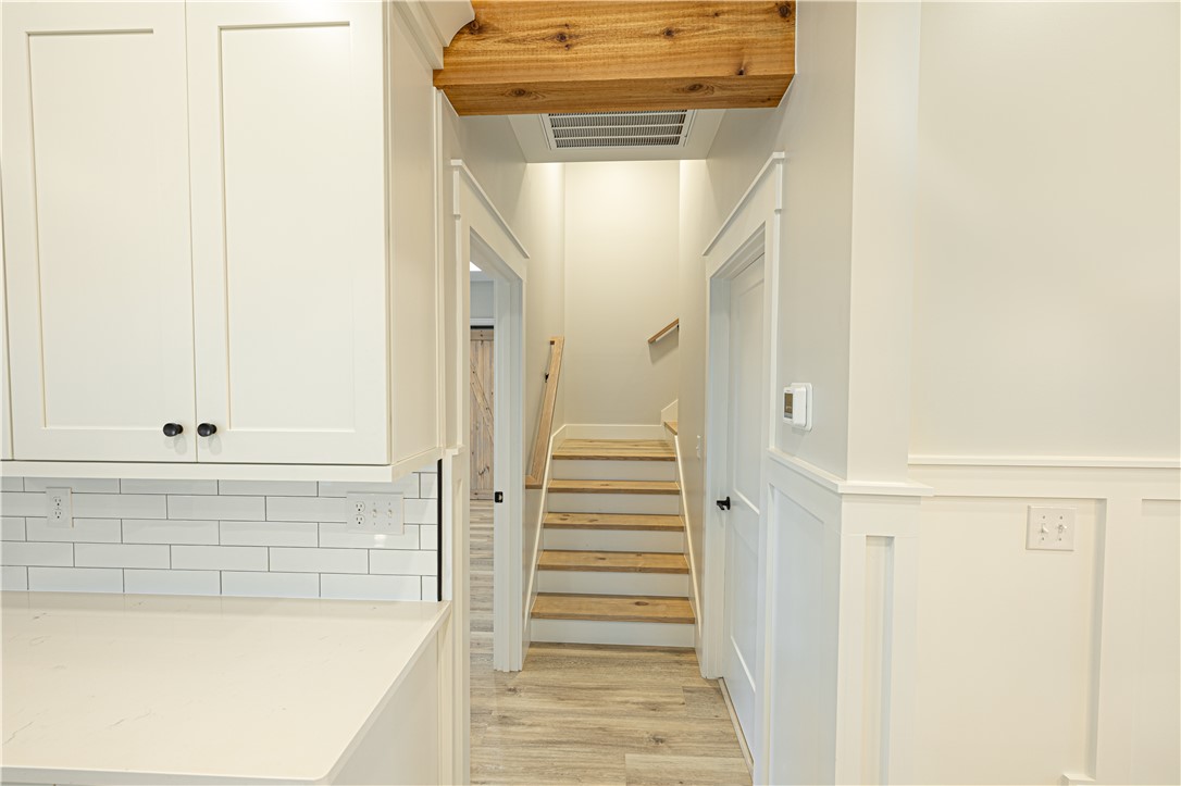 110 Hart Road Anderson, SC 29621 - Photo 6 of 31 Clean lines and modern design define this inviting entry and stairwell.