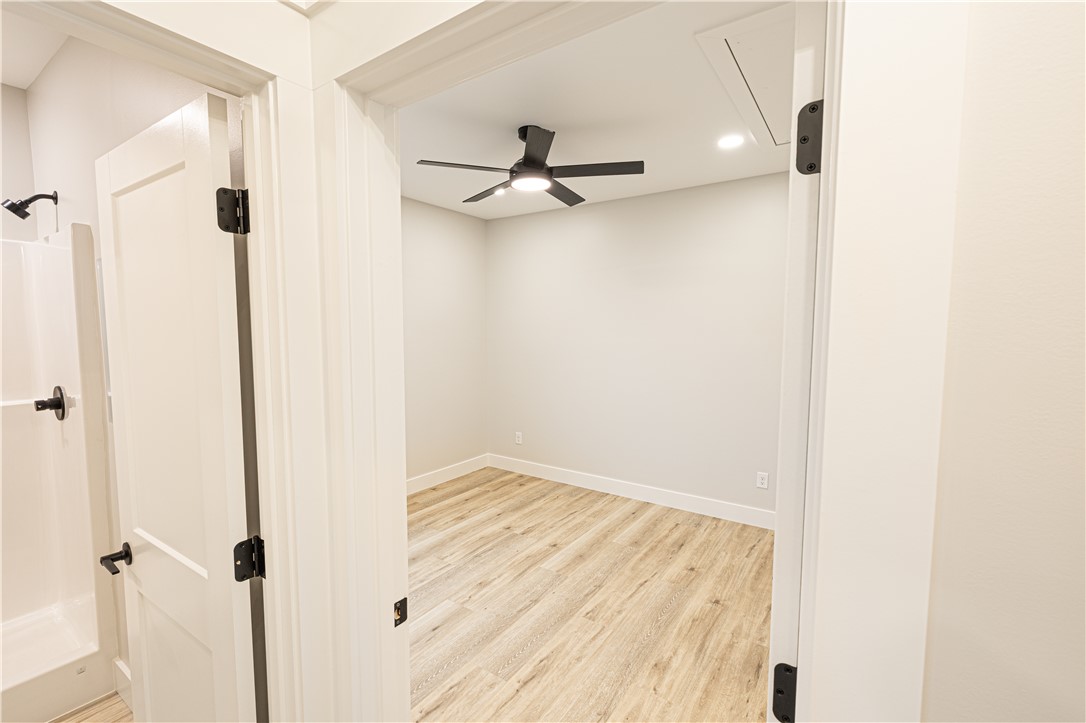 110 Hart Road Anderson, SC 29621 - Photo 7 of 31 This flexible room features durable flooring and a ceiling fan for comfort and convenience.