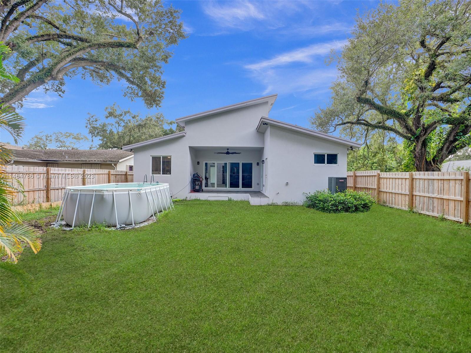 1543 Southwest 32nd Street Fort Lauderdale, FL 33315 - Photo 31 of 33 a view of a house with a yard and sitting area