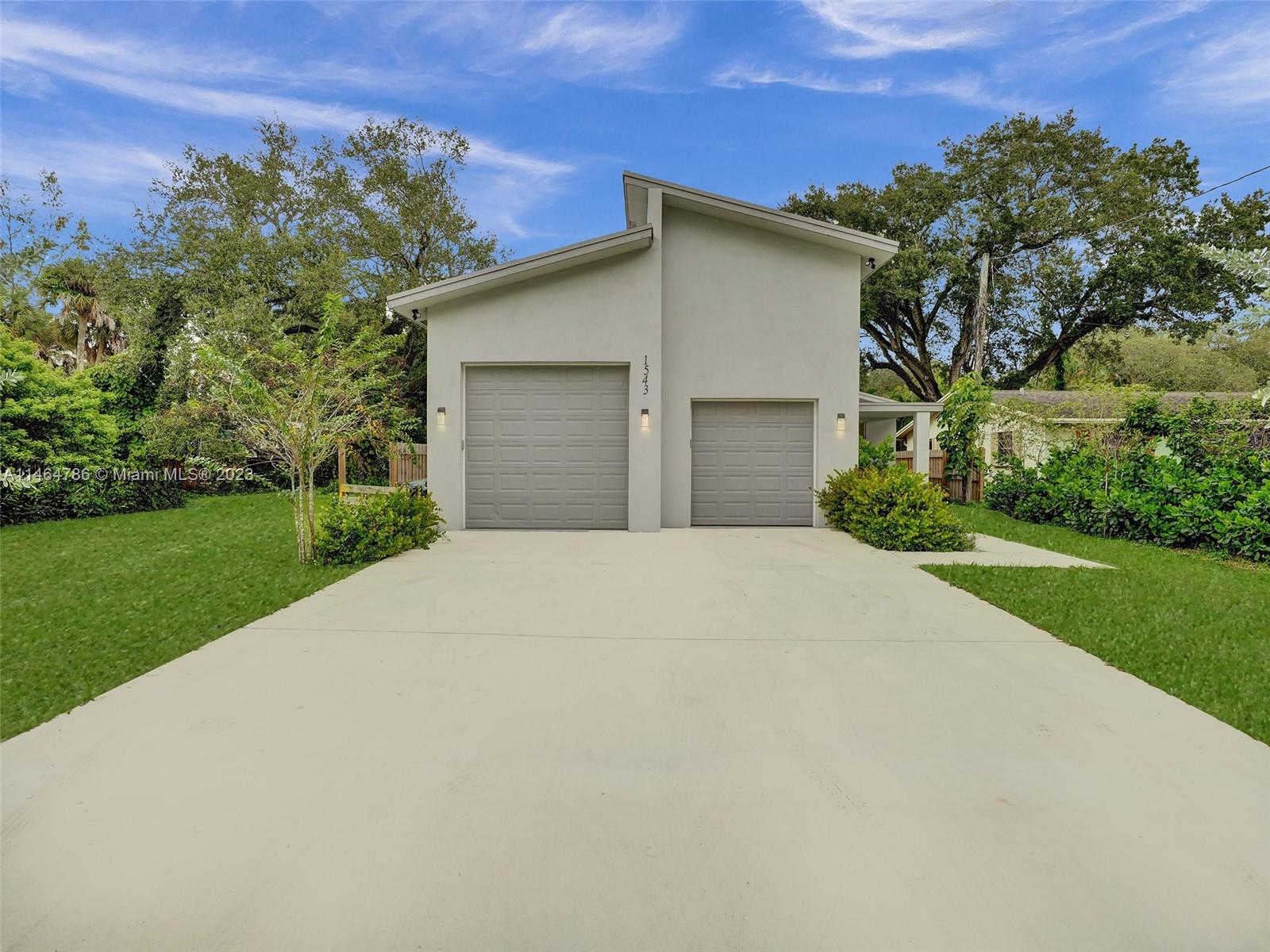 1543 Southwest 32nd Street Fort Lauderdale, FL 33315 - Photo 33 of 33 a view of a house with a yard
