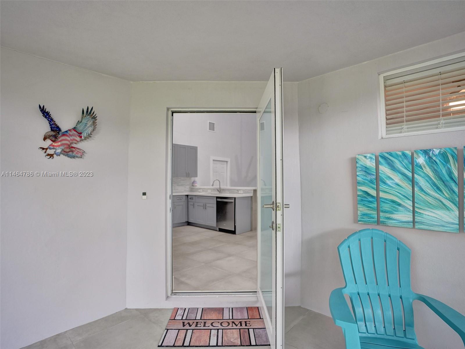 1543 Southwest 32nd Street Fort Lauderdale, FL 33315 - Photo 4 of 33 a view of kitchen with furniture and natural light
