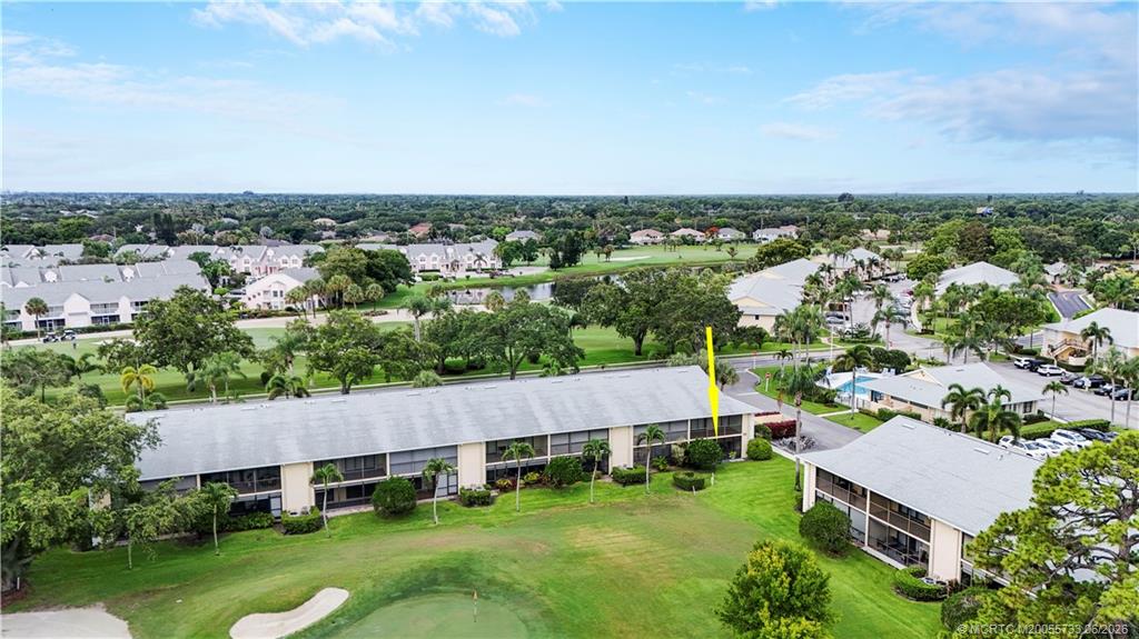 1001 Keystone Drive, Unit A Jupiter, FL 33458 - Photo 28 of 30 an aerial view of a house with a garden