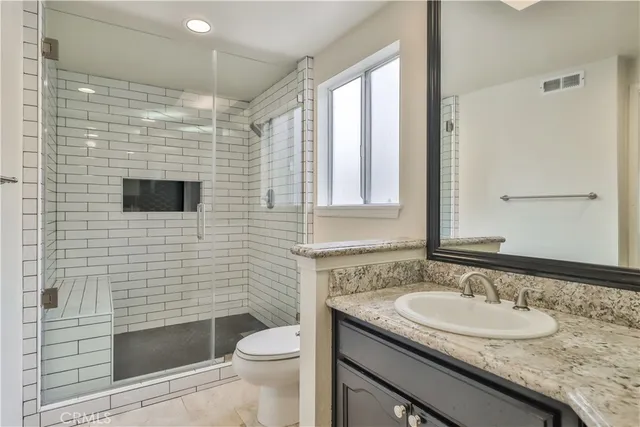 a view of a swimming pool with a yard