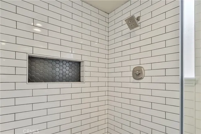 a view of a swimming pool with an outdoor space and seating area