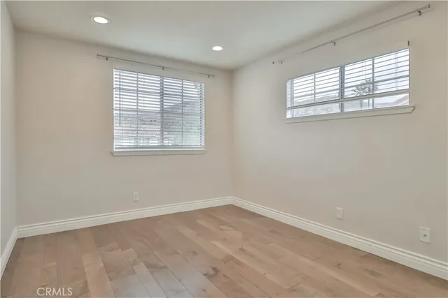 a view of a park with large trees