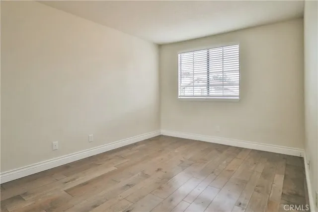 a view of a park and trees