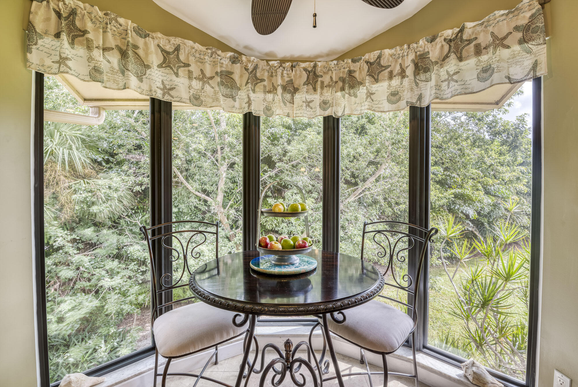 17165 Waterbend Drive, Unit 207 Jupiter, FL 33477 - Photo 11 of 27 a view of a dining room with furniture window and outside view