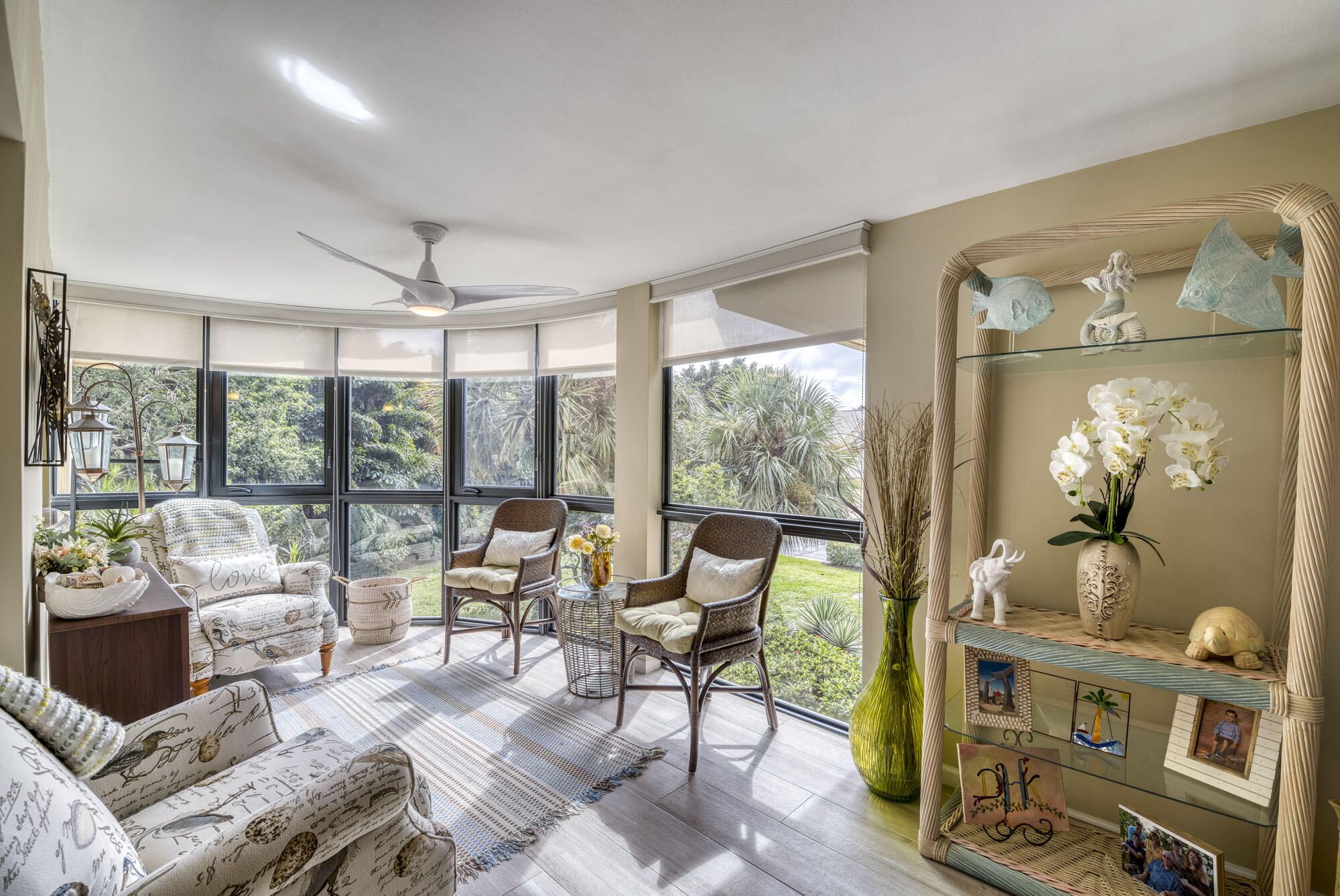 17165 Waterbend Drive, Unit 207 Jupiter, FL 33477 - Photo 15 of 27 a living room with furniture and a large window
