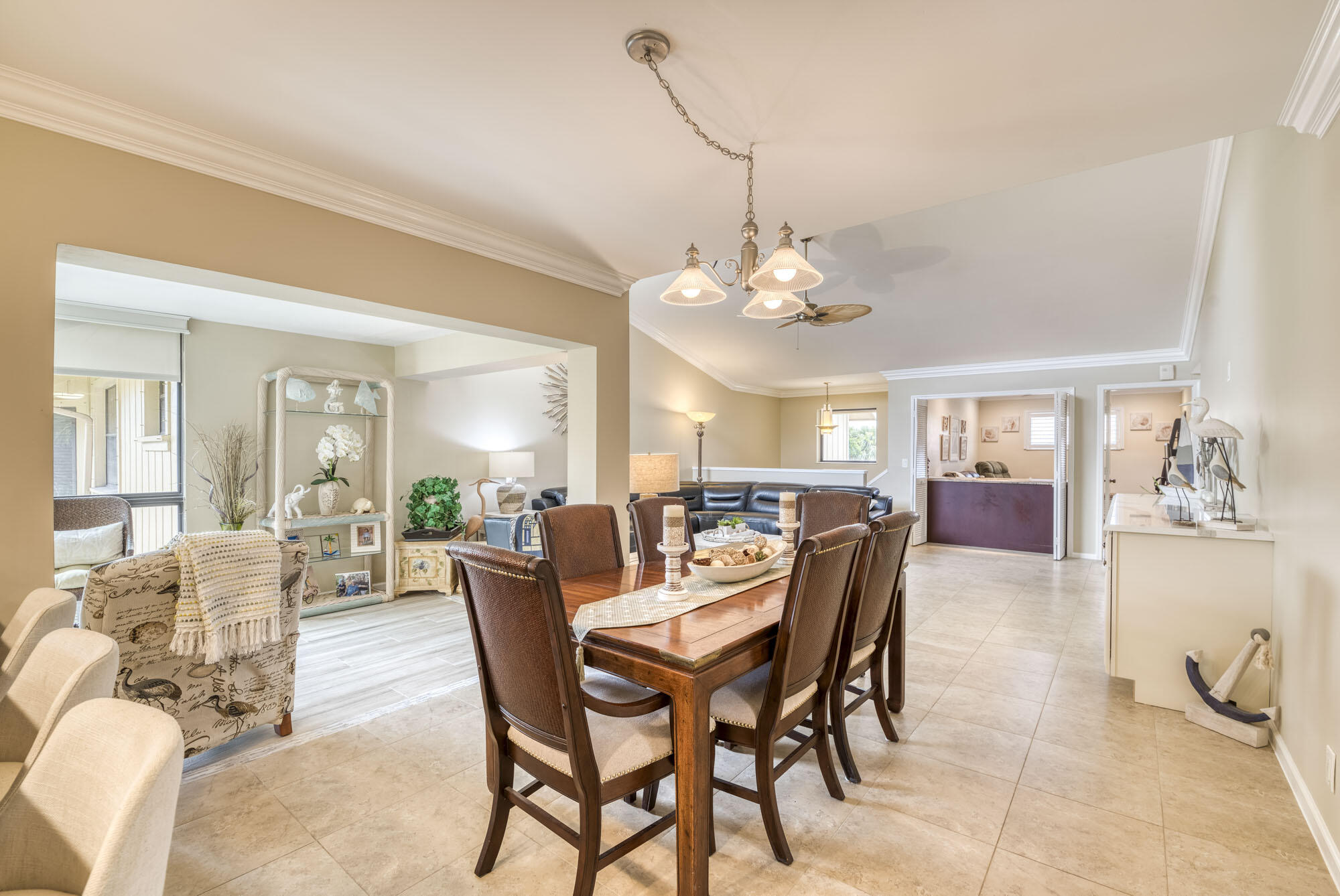 17165 Waterbend Drive, Unit 207 Jupiter, FL 33477 - Photo 5 of 27 a view of a dining room with furniture