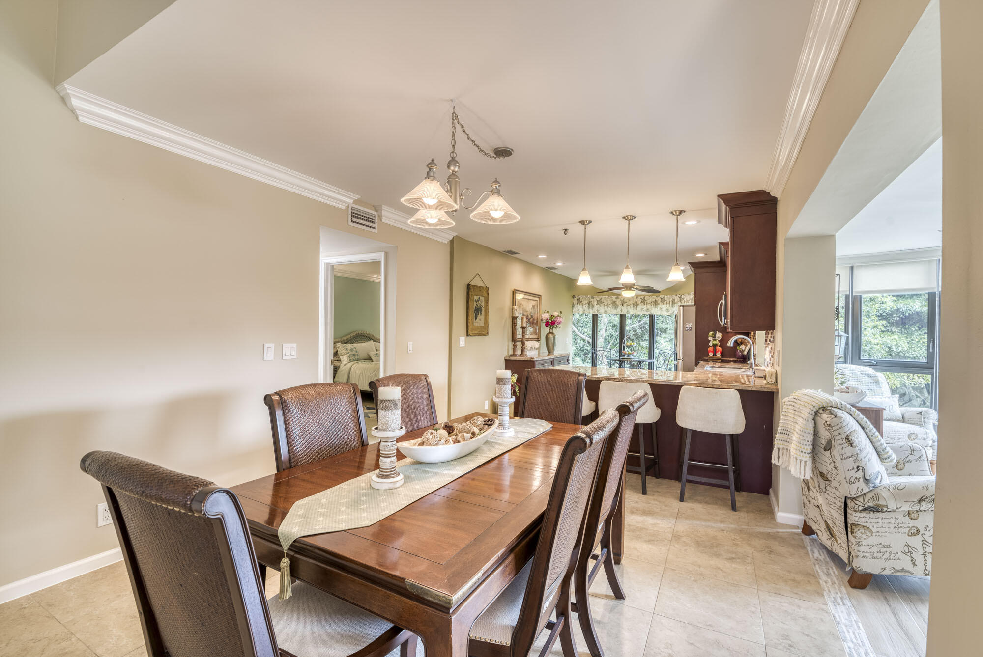17165 Waterbend Drive, Unit 207 Jupiter, FL 33477 - Photo 7 of 27 a view of a dining room with furniture window and outside view