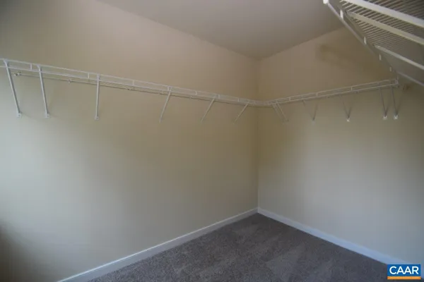 a view of a room with racks on the wall