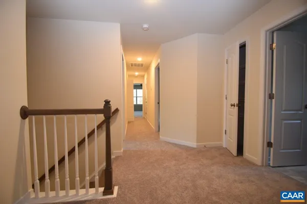 a view of hallway with stairs