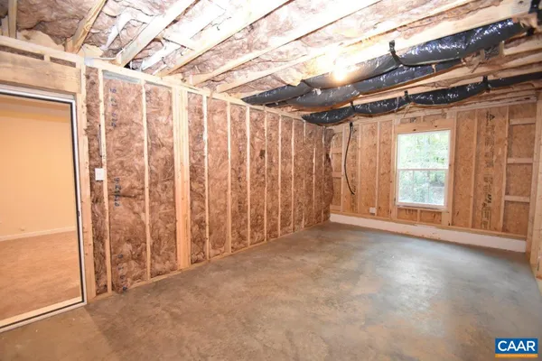 a view of a room with a large window