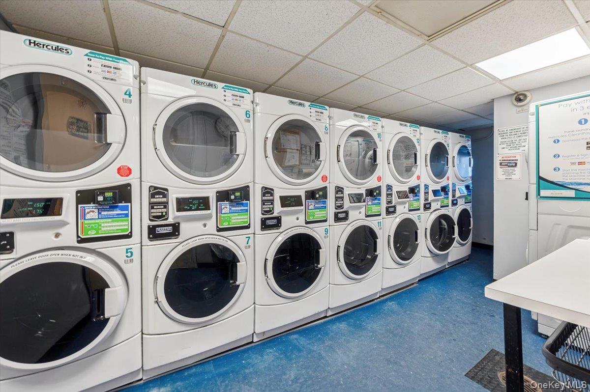 2 Bronxville Road, Unit 8D Bronxville, NY 10708 - Photo 15 of 23 a utility room with dryer and washer