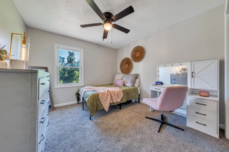 6400 Stewartsville Road Moneta, VA 24121 - Photo 11 of 33 a bedroom with a bed dresser and a window