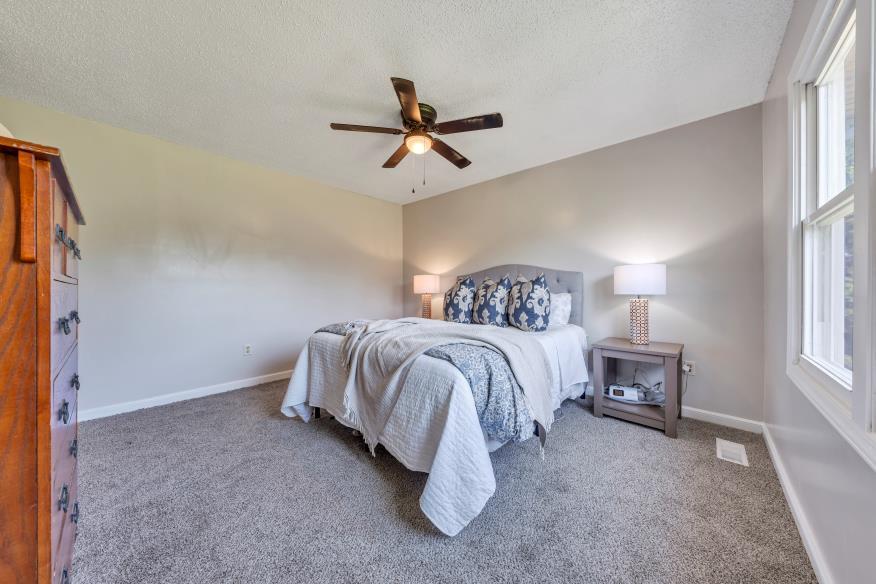 6400 Stewartsville Road Moneta, VA 24121 - Photo 15 of 33 a bedroom with a bed and window