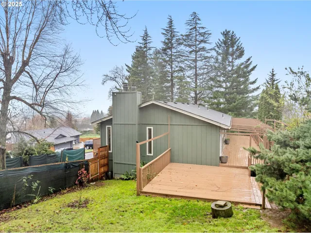an aerial view of a house with yard swimming pool and outdoor seating
