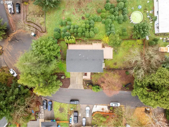 a backyard of a house with yard and outdoor seating