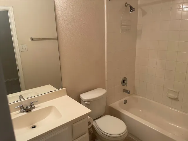 a view of a room that has a window in it