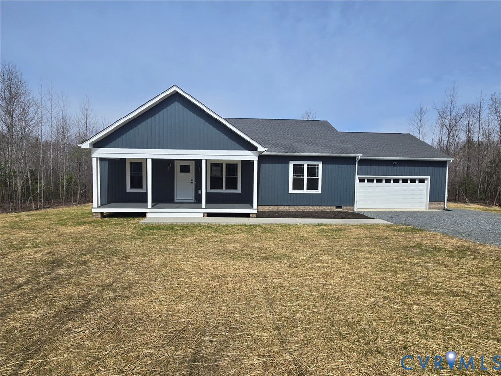 1781 Bumpass Road Bumpass, VA 23024 - Photo 1 of 26 a front view of a house with a yard