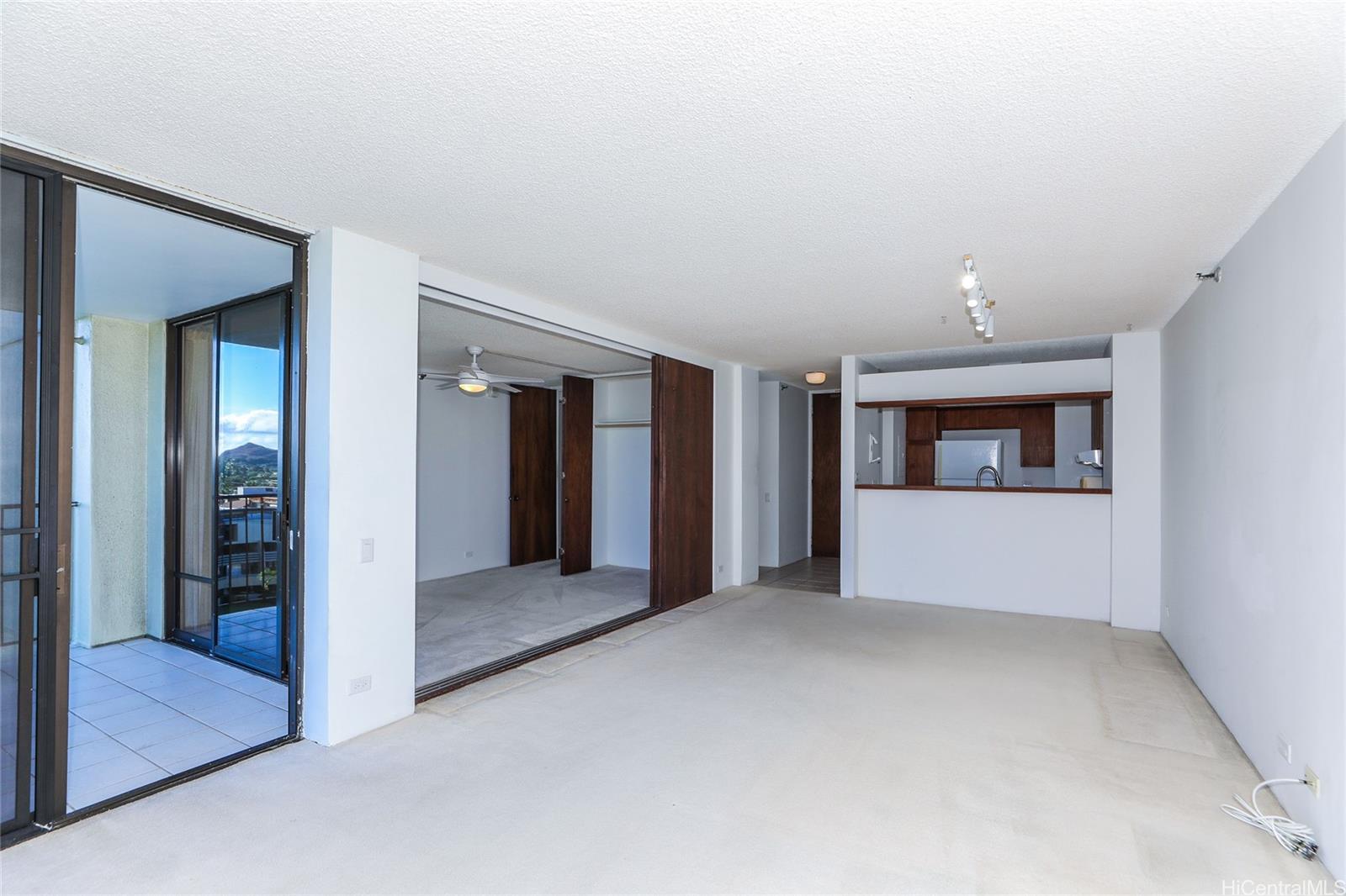 322 Aoloa Street, Unit 709 Kailua, HI 96734 - Photo 9 of 24 Living room with 2nd bedroom and lanai off to the side.