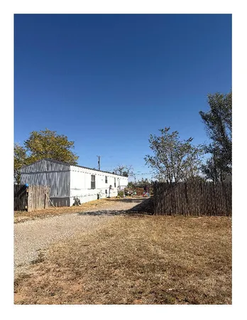 a view of open space and yard
