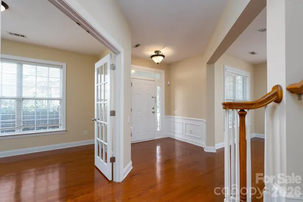 a view of entryway with wooden floor