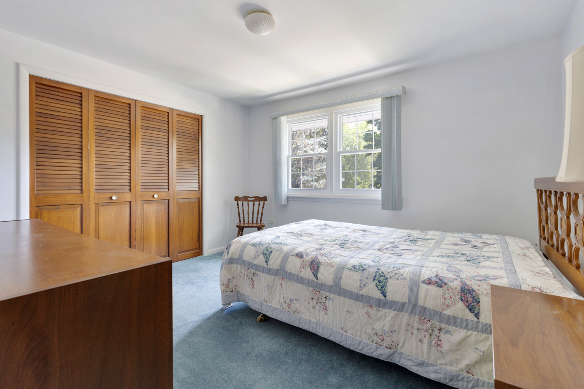 690 Stanford Drive Marengo, IL 60152 - Photo 18 of 30 a bedroom with a bed and a window