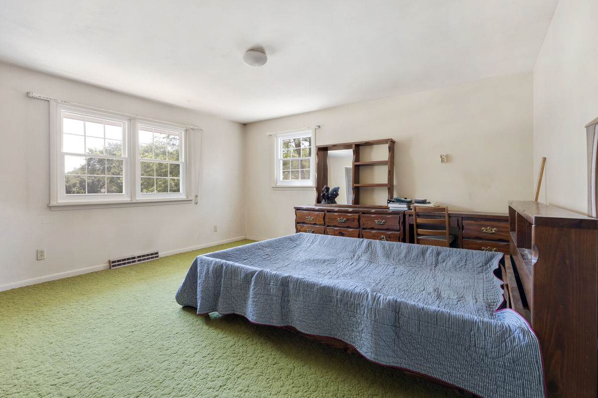 690 Stanford Drive Marengo, IL 60152 - Photo 21 of 30 a bedroom with a bed window and a dresser