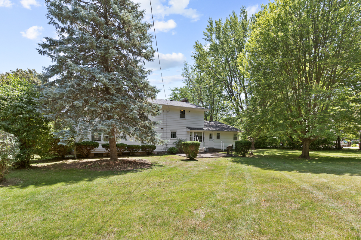 690 Stanford Drive Marengo, IL 60152 - Photo 25 of 30 a view of a house with a yard and sitting area