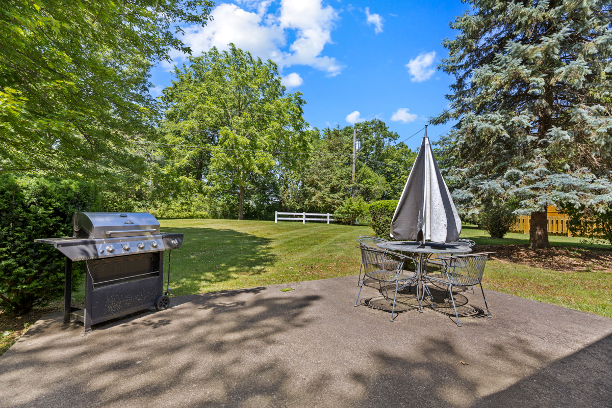 690 Stanford Drive Marengo, IL 60152 - Photo 26 of 30 a view of a bench in a garden