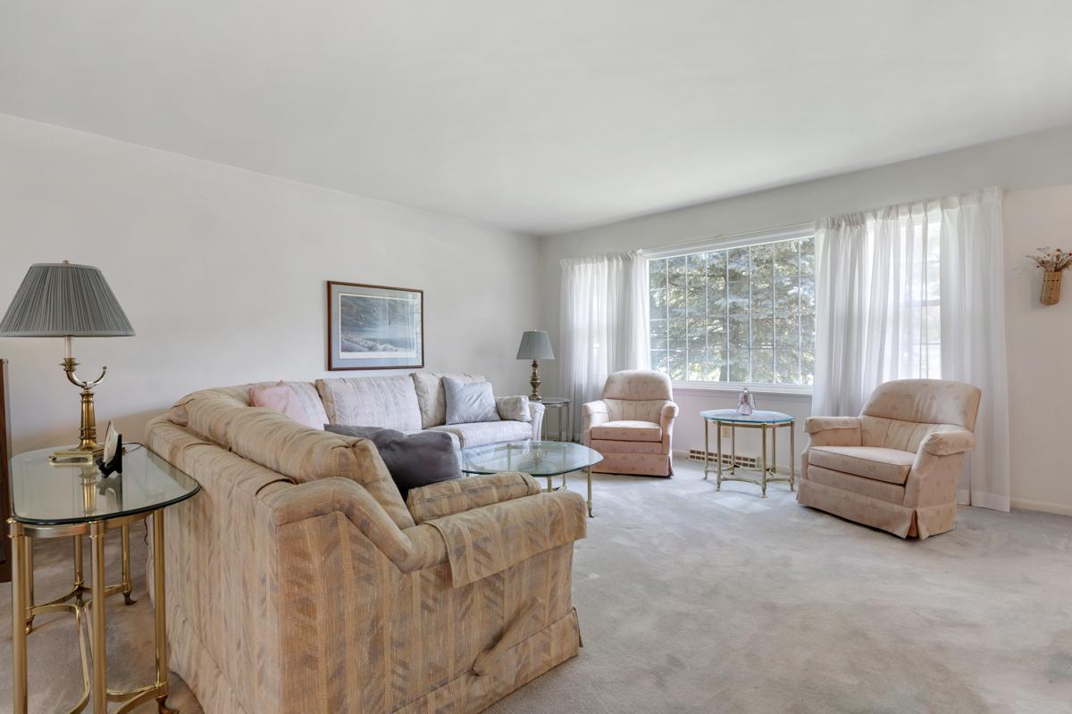 690 Stanford Drive Marengo, IL 60152 - Photo 3 of 30 a living room with furniture and a large window
