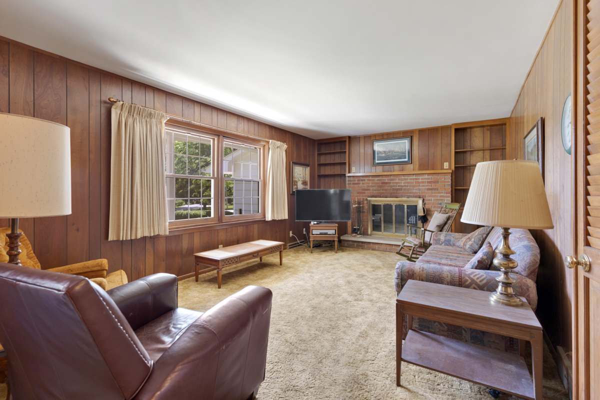 690 Stanford Drive Marengo, IL 60152 - Photo 7 of 30 a living room with furniture and a fireplace