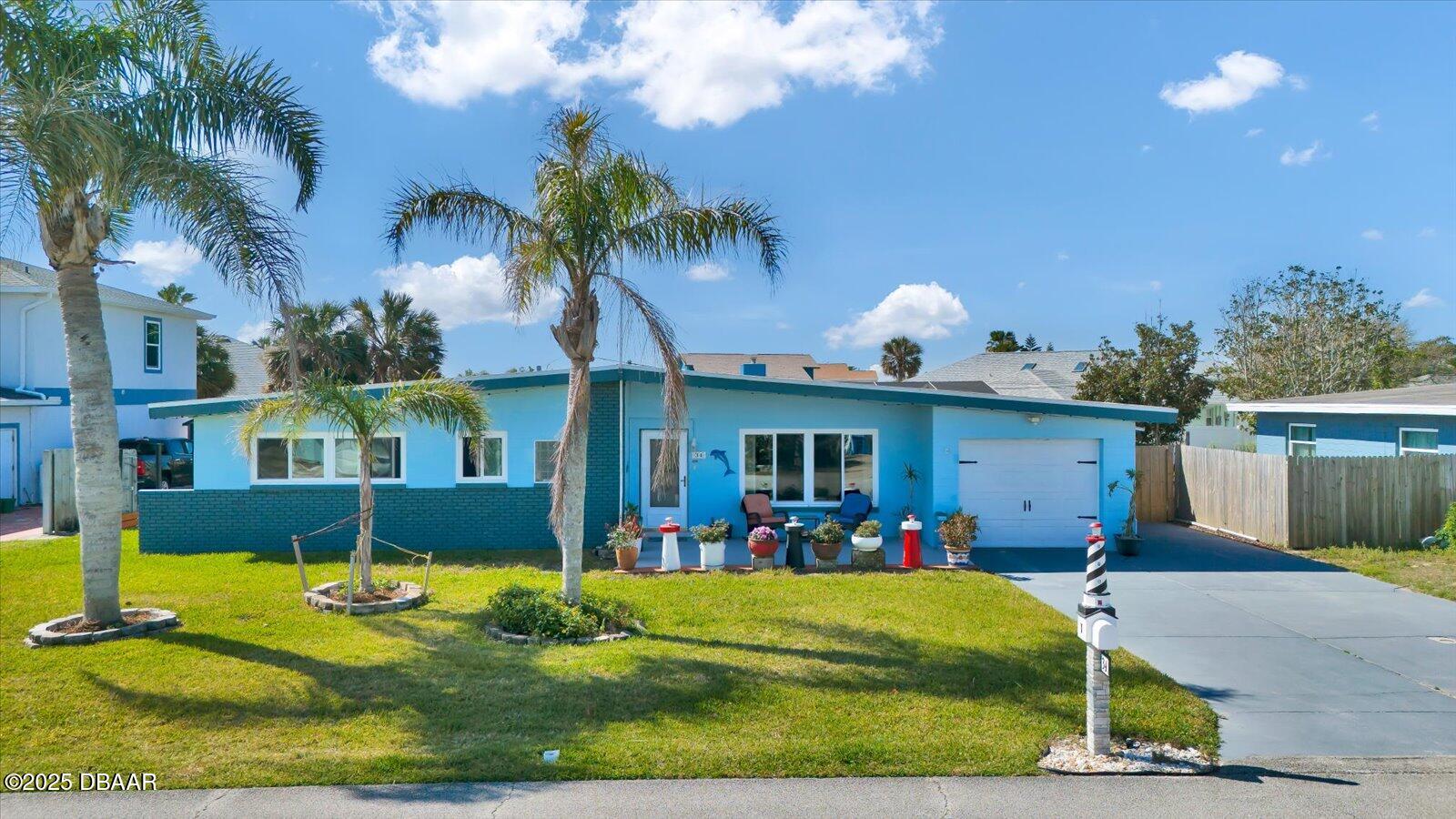 34 Dolphin Avenue Ormond Beach, FL 32176 - Photo 2 of 52 a view of a house with swimming pool and porch