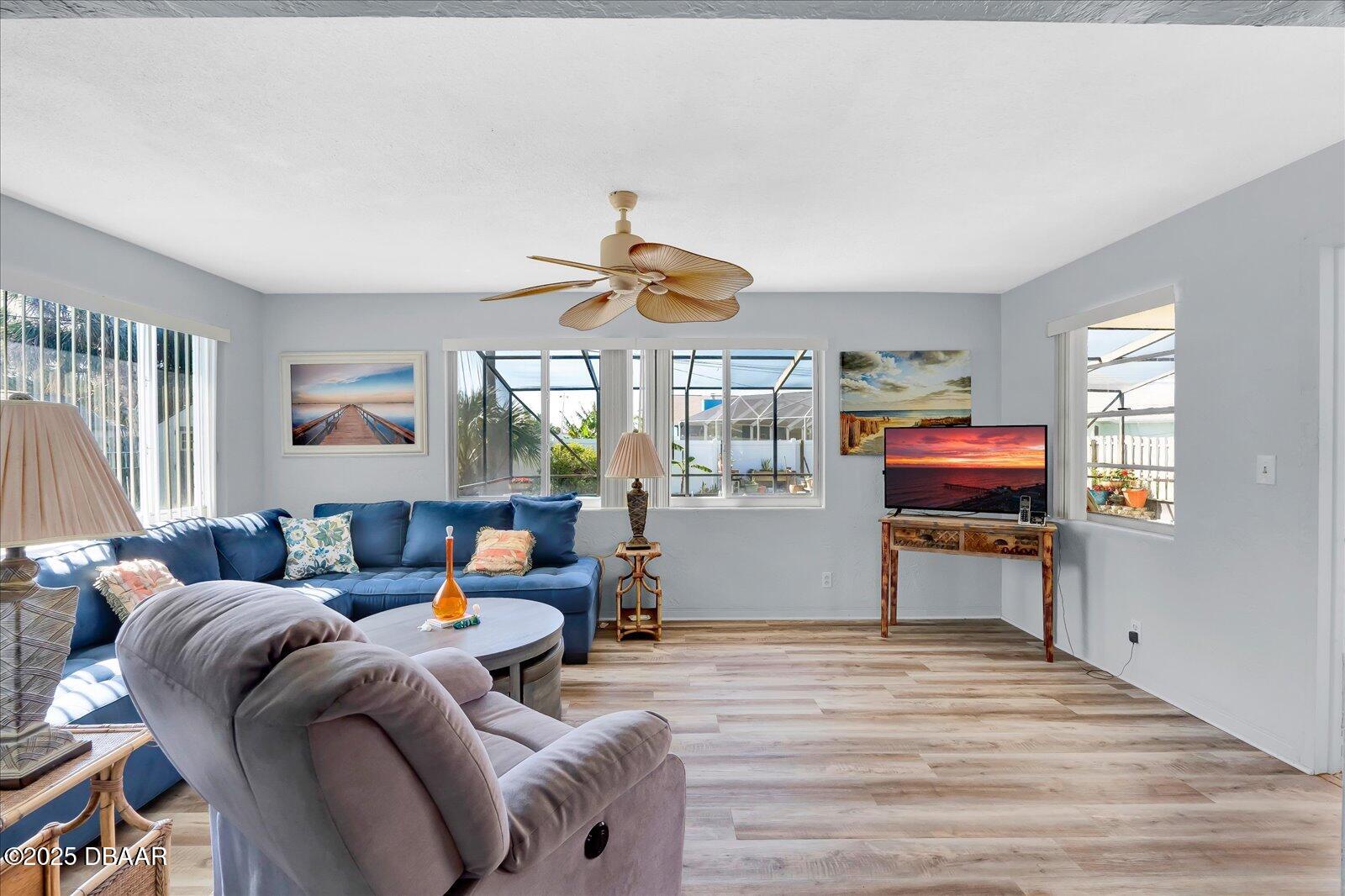 34 Dolphin Avenue Ormond Beach, FL 32176 - Photo 23 of 52 a living room with furniture kitchen view and a window