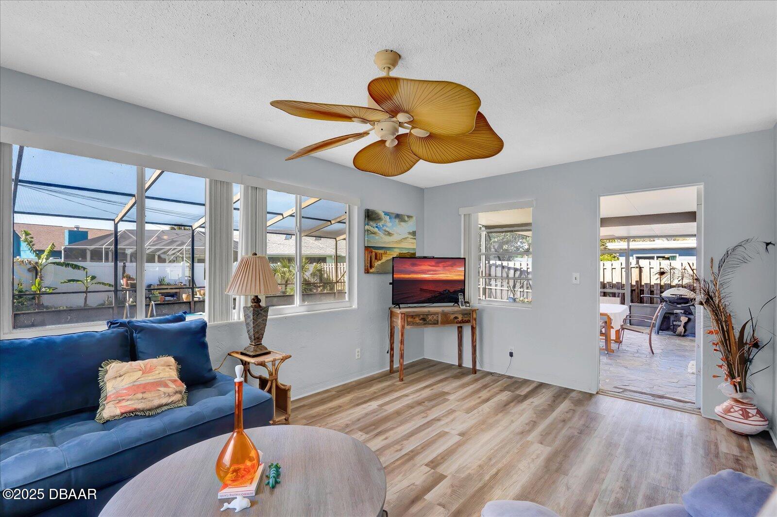 34 Dolphin Avenue Ormond Beach, FL 32176 - Photo 27 of 52 a bedroom with furniture and a large window