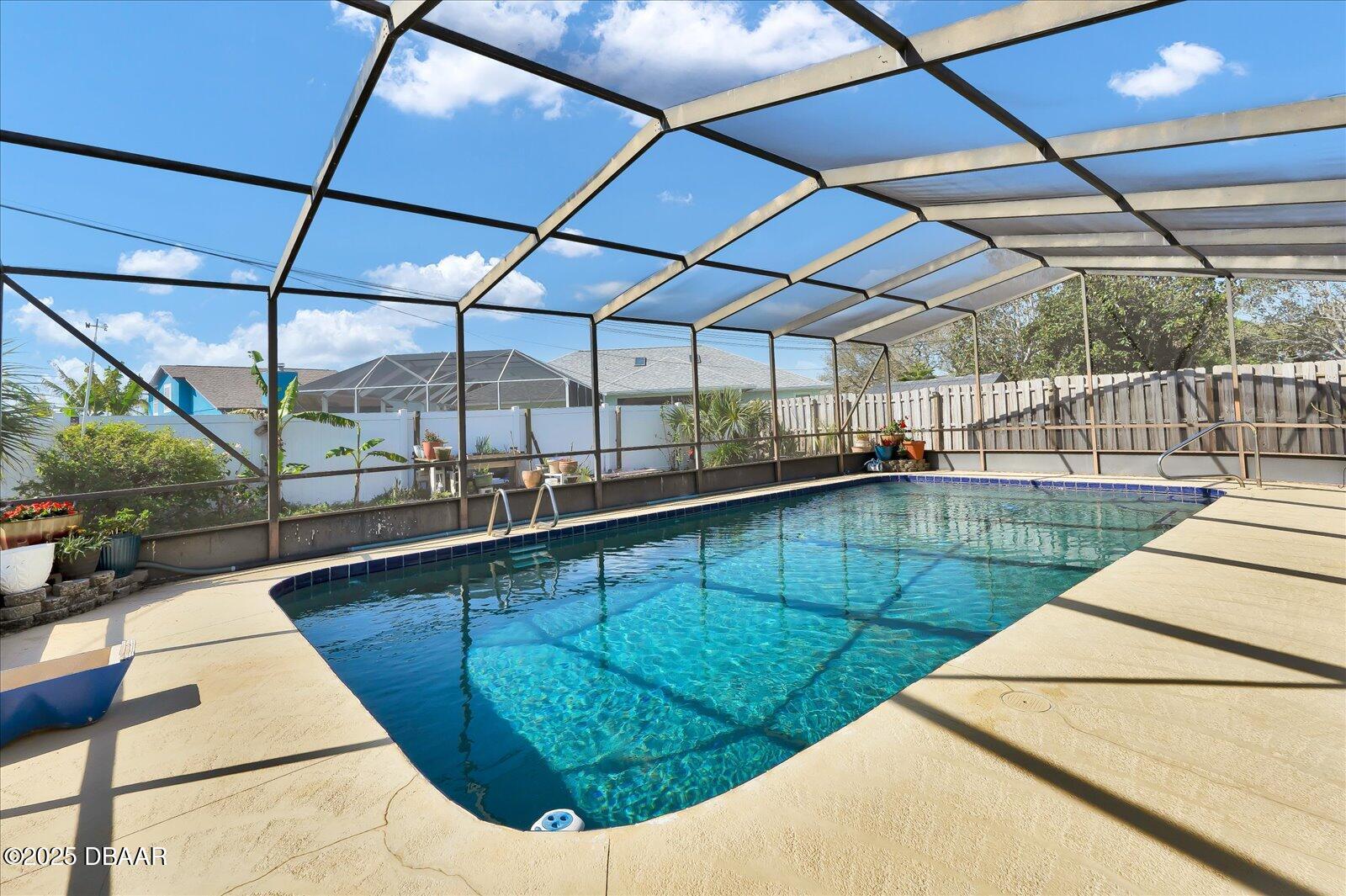 34 Dolphin Avenue Ormond Beach, FL 32176 - Photo 33 of 52 a view of a swimming pool