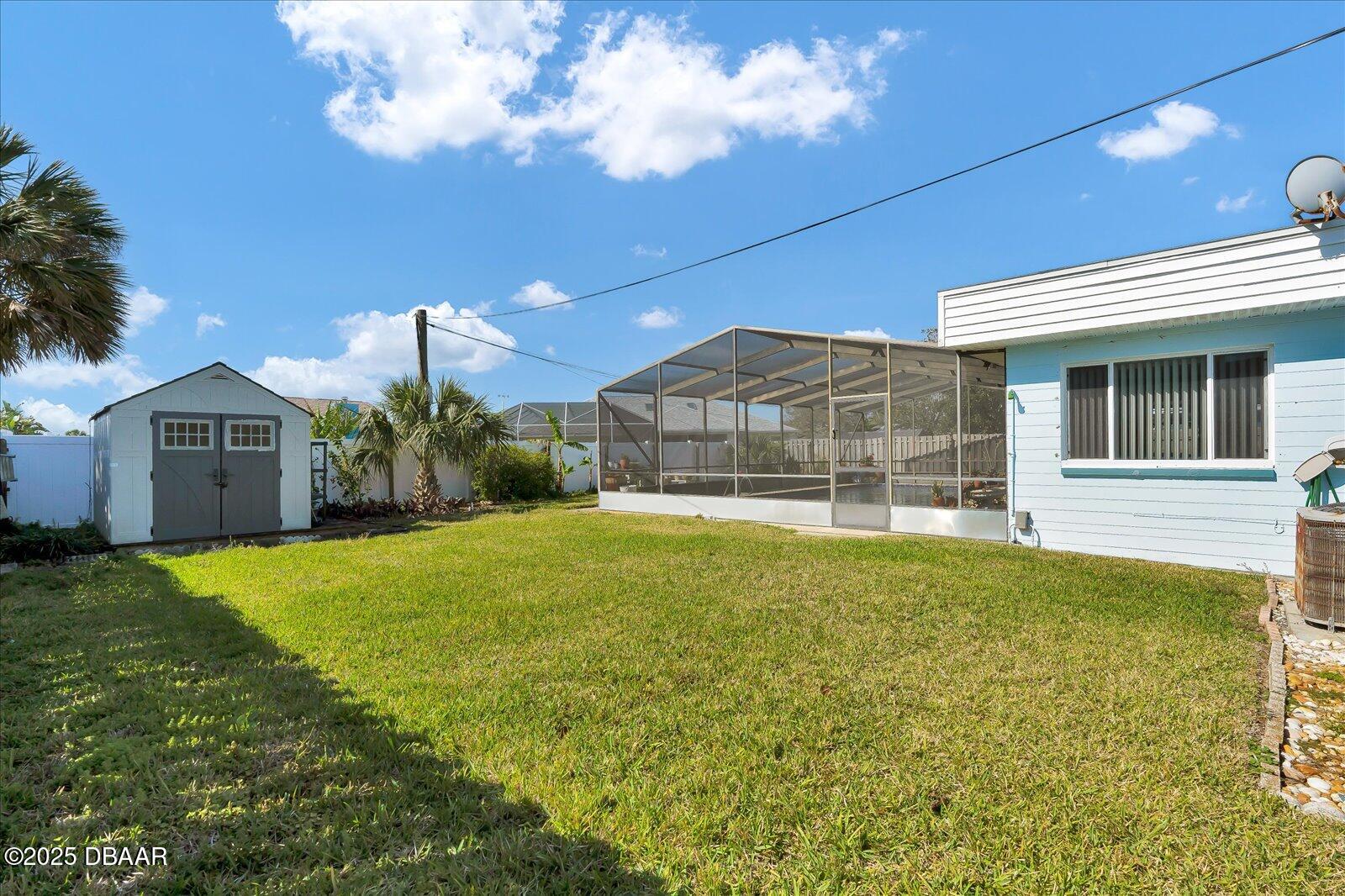 34 Dolphin Avenue Ormond Beach, FL 32176 - Photo 34 of 52 a view of a house with backyard and garden