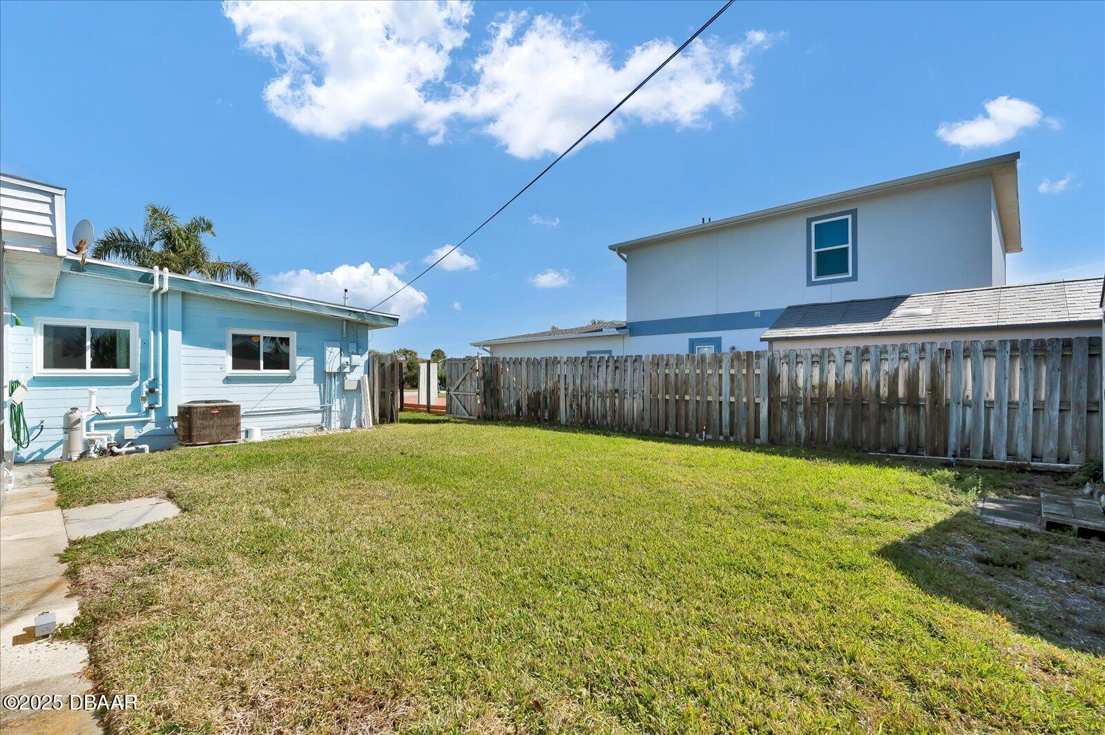 34 Dolphin Avenue Ormond Beach, FL 32176 - Photo 35 of 52 a view of a house with backyard and patio
