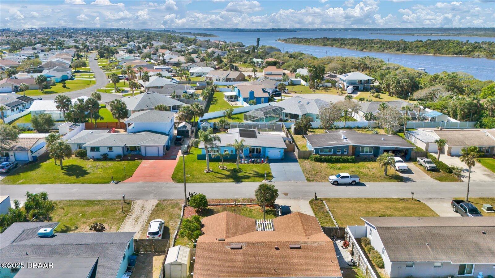 34 Dolphin Avenue Ormond Beach, FL 32176 - Photo 40 of 52 an aerial view of residential houses with outdoor space and swimming pool