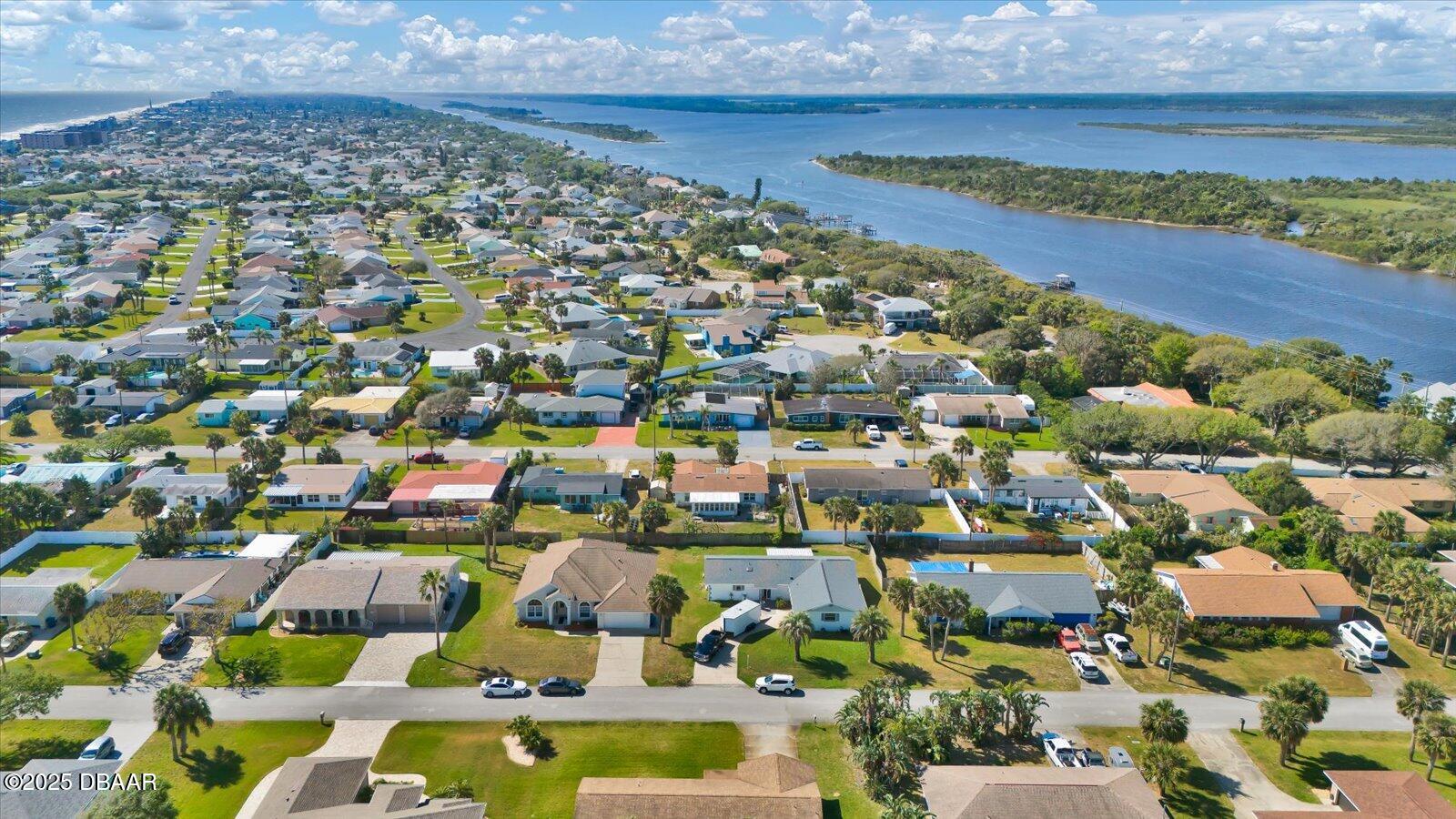 34 Dolphin Avenue Ormond Beach, FL 32176 - Photo 41 of 52 an aerial view of residential houses with outdoor space