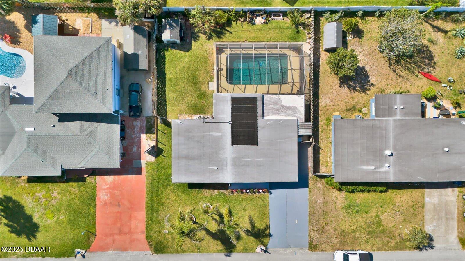 34 Dolphin Avenue Ormond Beach, FL 32176 - Photo 43 of 52 an aerial view of a house with a swimming pool